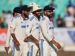 India's captain Rohit Sharma celebrates with Ravindra Jadeja, Jasprit Bumrah and others after winning the match 