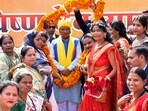 Chhattisgarh Chief Minister Vishnu Deo Sai being garlanded on his arrival for the inauguration and foundation stone laying ceremony of various developmental projects, in Narayanpur, Saturday, Feb. 3, 2024.