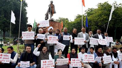 AAP MLAs protest at the Delhi assembly on Tuesday. (Arvid Yadav/HT Photo) AAP MLAs protest at the Delhi assembly on Tuesday. (Arvid Yadav/HT Photo)