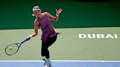 Victoria Azarenka returns the ball to Arantxa Rus of the Netherlands during a match of the Dubai Duty Free Tennis Championships in Dubai (AP)