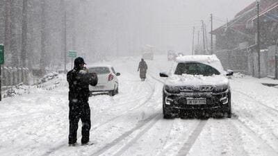 Cars covered under a blanket of snow in Shopian, Kashmir. (ANI) Cars covered under a blanket of snow in Shopian, Kashmir. (ANI)