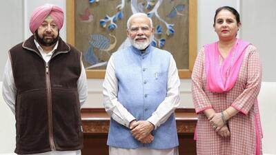 Former Punjab chief minister and BJP leader Capt Amarinder Singh and his daughter and state women’s wing leader Jai Inder Kaur with Prime Minister Narendra Modi in New Delhi on Monday evening. (HT Photo)