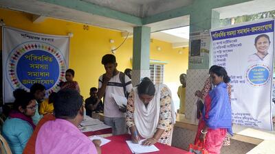 North 24 Parganas: Locals visit the government help camp at Sandeshkhali to resolve their grievances, in North 24 Parganas on Monday. (ANI)