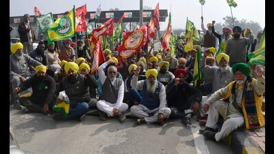 On Tuesday, farmers belonging to SKM and Kirti Kisan Union from across the state, joined the protesters at Ladhowal toll plaza. (HT Photo)