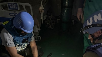 This handout photograph taken by the World Health Organization (WHO), shows a patient being evacuated during a mission by WHO, UN humanitarian agency OCHA and the Palestinian Red Crescent, to move patients from Nasser hospital in Khan Yunis in the southern Gaza Strip to other hospitals, amid ongoing fighting between Israel and the Palestinian militant group Hamas. (AFP) This handout photograph taken by the World Health Organization (WHO), shows a patient being evacuated during a mission by WHO, UN humanitarian agency OCHA and the Palestinian Red Crescent, to move patients from Nasser hospital in Khan Yunis in the southern Gaza Strip to other hospitals, amid ongoing fighting between Israel and the Palestinian militant group Hamas. (AFP)