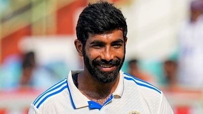 India's Jasprit Bumrah poses for photos with the 'Player of the Match' trophy after the second Test match between India and England, at Dr Y.S. Rajasekhara Reddy ACA-VDCA Cricket Stadium, in Visakhapatnam (PTI) India's Jasprit Bumrah poses for photos with the 'Player of the Match' trophy after the second Test match between India and England, at Dr Y.S. Rajasekhara Reddy ACA-VDCA Cricket Stadium, in Visakhapatnam (PTI)