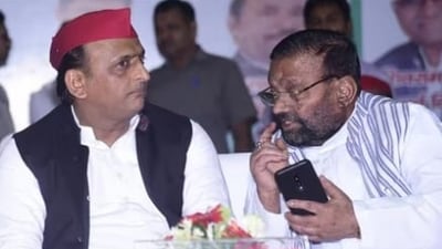 Swami Prasad Maurya with Akhilesh Yadav (File photo) Swami Prasad Maurya with Akhilesh Yadav (File photo)