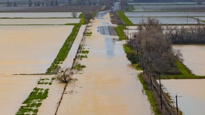 Biggs Willows Road is seen flooded and impassable in Willows, California on February 19, 2024. Threats of tornadoes, waterspouts and localized flooding has many Californians on high alert as storms continue to bombard the state. (AFP)