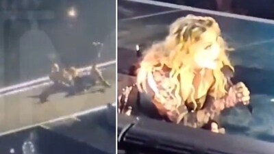 Madonna fell off a chair while performing in Seattle (TMZ screenshot, @CollinRugg/X)