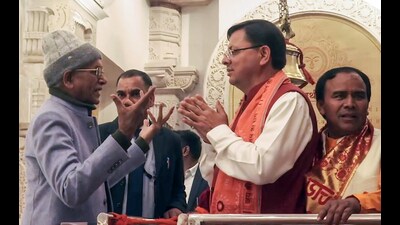 Uttarakhand CM Pushkar Singh Dhami and Ram Janmabhoomi Teerth Kshetra General Secretary Champat Rai in a conversation during the CM's visit to Ram Temple in Ayodhya on Tuesday (ANI)
