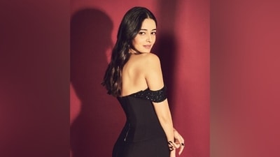Ananya accessorised the black gown with minimal accessories, including black peep-toe heels with embellished ankle straps, a choker necklace, statement rings, and dainty earrings. Lastly, she chose to style her wavy locks in a side parting and let them fall open on her shoulder. (Instagram) Ananya accessorised the black gown with minimal accessories, including black peep-toe heels with embellished ankle straps, a choker necklace, statement rings, and dainty earrings. Lastly, she chose to style her wavy locks in a side parting and let them fall open on her shoulder. (Instagram)