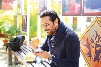 Recalling his days spent in Mandi House, the actor relishes a kachori from the Bengali Market. (Photo: Manoj Verma/HT) Recalling his days spent in Mandi House, the actor relishes a kachori from the Bengali Market. (Photo: Manoj Verma/HT)
