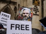 Supporters of WikiLeaks founder Julian Assange protest outside the high court, on the day Assange appeals against his extradition to the United States, in London, Britain, February 21, 2024. 