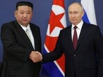 Russian President Vladimir Putin (right) and North Korea's leader Kim Jong Un 