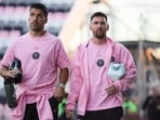 Inter Miami CF forward Luis Suarez (9) and forward Lionel Messi (10) ahead of a pre-season match.