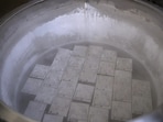 A container holding frozen embroys and sperms A container holding frozen embroys and sperms
