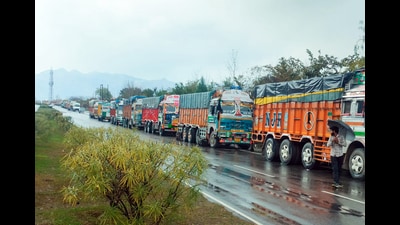 A glimpse of the trucks standing in a queue as the Jammu-Srinagar highway blocked for the third day after landslides hit several places, in Jammu on Wednesday. (ANI)