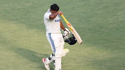 Sarfaraz Khan walks back after being run out. (ANI)