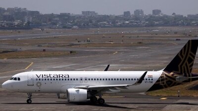 A Vistara passenger aircraft taxis on the tarmac at Chhatrapati Shivaji International Airport in Mumbai, India. A Vistara passenger aircraft taxis on the tarmac at Chhatrapati Shivaji International Airport in Mumbai, India.