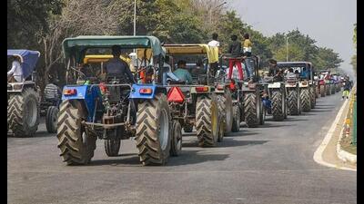 Farmers took out a tractor march and held a dharna in front of the district collectorate in Uttarakhand’s Rudrapur on Wednesday in support of their demands.