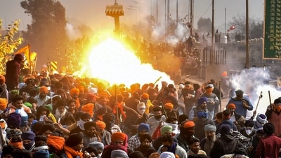 Haryana Police on Wednesday dropped tear gas on farmers protesting on the Shambhu border between Punjab and Haryana. (PTI) Haryana Police on Wednesday dropped tear gas on farmers protesting on the Shambhu border between Punjab and Haryana. (PTI)