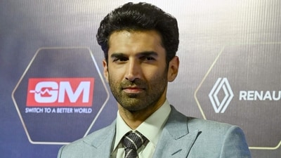 Bollywood actor Aditya Roy Kapur attends the Dadasaheb Phalke International Film Festival Awards 2024 in Mumbai on February 20, 2024. He wore a grey-blue suit and posed solo at the red carpet. (AFP) Bollywood actor Aditya Roy Kapur attends the Dadasaheb Phalke International Film Festival Awards 2024 in Mumbai on February 20, 2024. He wore a grey-blue suit and posed solo at the red carpet. (AFP)