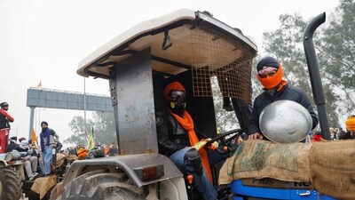 Farmers sat on a tractor at the frontline of the protest site as they marched towards the national capital to press for better crop prices. (Reuters)