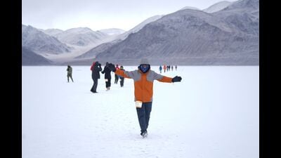In subzero temperature, the second edition of Pangong frozen lake marathon, the world’s highest frozen lake marathon, was successfully conducted in eastern Ladakh on Tuesday. (HT Photo)