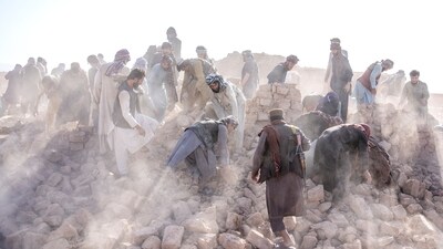 Afghan volunteers clean up rubble after an earthquake in Zenda Jan district in Herat province, western Afghanistan (AP) Afghan volunteers clean up rubble after an earthquake in Zenda Jan district in Herat province, western Afghanistan (AP)