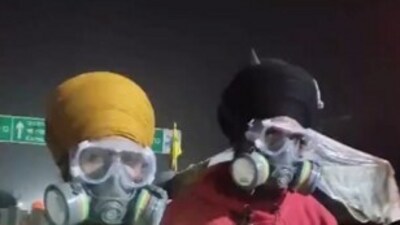 Farmers wearing gas mask at Shambhu Border as they prepare to resume their 'Delhi Chalo' march today.