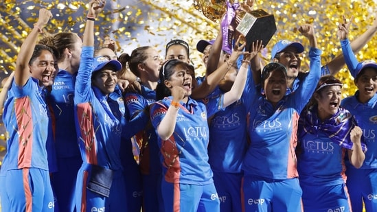 Mumbai Indians skipper Harmanpreet Kaur along with teammates celebrate with the Womens Premier League 2023 (WPL/Twitter)