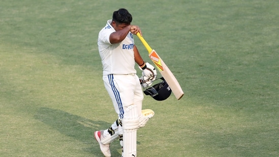 Sarfaraz Khan walks back after being run out. (ANI)
