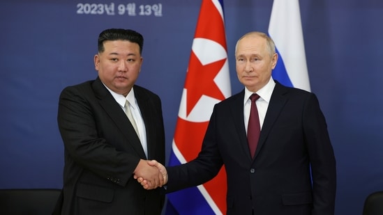 Russian President Vladimir Putin (right) and North Korea's leader Kim Jong Un (AP)