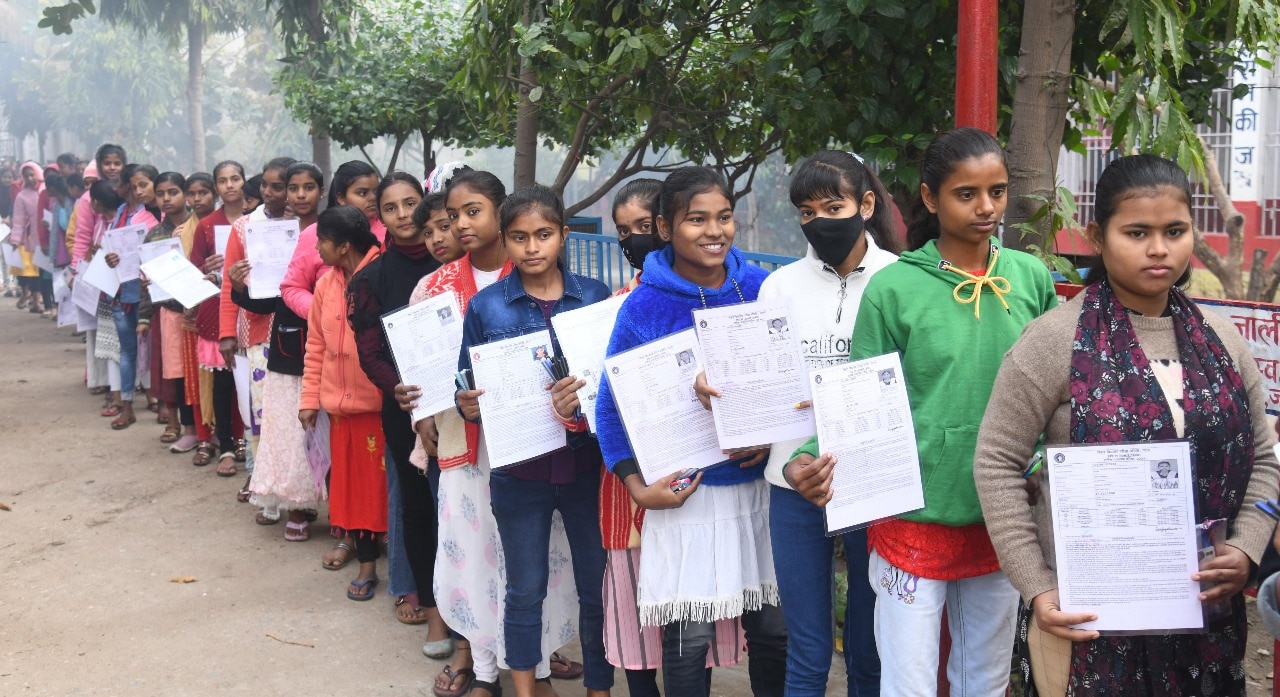 Students standing in queue to appear in the Bihar Board class 10th examination at DAV High School Danapur in Patna 
Photo by santosh Kumar
