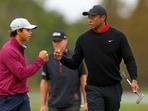 Tiger Woods (R) and Charlie Woods Tiger Woods (R) and Charlie Woods