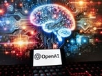 FILE - The OpenAI logo is displayed on a cell phone with an image on a computer monitor generated by ChatGPT's Dall-E text-to-image model, Friday, Dec. 8, 2023, in Boston. FILE - The OpenAI logo is displayed on a cell phone with an image on a computer monitor generated by ChatGPT's Dall-E text-to-image model, Friday, Dec. 8, 2023, in Boston.