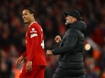 Soccer Football - Premier League - Liverpool v Luton Town - Anfield, Liverpool, Britain - February 21, 2024 Liverpool's Virgil van Dijk and manager Juergen Klopp celebrate after the match REUTERS/Molly Darlington NO USE WITH UNAUTHORIZED AUDIO, VIDEO, DATA, FIXTURE LISTS, CLUB/LEAGUE LOGOS OR 'LIVE' SERVICES. ONLINE IN-MATCH USE LIMITED TO 45 IMAGES, NO VIDEO EMULATION. NO USE IN BETTING, GAMES OR SINGLE CLUB/LEAGUE/PLAYER PUBLICATIONS.