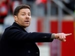 Bayer Leverkusen coach Xabi Alonso reacts during a match.