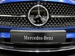 The Mercedes-Benz logo is displayed on the front of a Mercedes-Benz CLE Cabriolet passenger car at the Annual Results Conference of the Mercedes-Benz Group AG in Stuttgart, southern Germany 