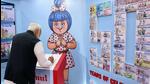 Ahmedabad, Feb 22 (ANI): Prime Minister Narendra Modi inspects an exhibition by Amul during the Golden Jubilee Celebrations of the Gujarat Cooperative Milk Marketing Federation, in Ahmedabad on Thursday. (ANI Photo) (PIB)