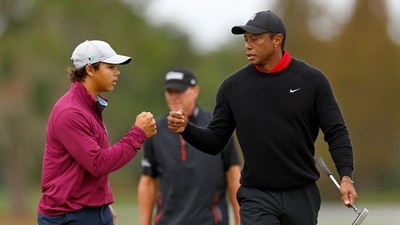 Tiger Woods (R) and Charlie Woods (Getty Images via AFP) Tiger Woods (R) and Charlie Woods (Getty Images via AFP)