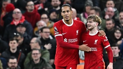 Liverpool's English midfielder Harvey Elliott (R) celebrates with Virgil van Dijk (AFP) Liverpool's English midfielder Harvey Elliott (R) celebrates with Virgil van Dijk (AFP)