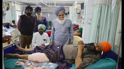 Family members visit farmer Yugraj Singh, who was allegedly injured on the Shambhu border (Punjab-Haryana) by the tear-gas shell of Haryana police, at Government Rajindra Hospital in Patiala on Thursday. (ANI) Family members visit farmer Yugraj Singh, who was allegedly injured on the Shambhu border (Punjab-Haryana) by the tear-gas shell of Haryana police, at Government Rajindra Hospital in Patiala on Thursday. (ANI)