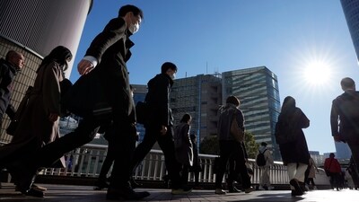 Commuters walk in a passageway during a rush hour at Shinagawa Station in Tokyo. Japan. (AP) Commuters walk in a passageway during a rush hour at Shinagawa Station in Tokyo. Japan. (AP)