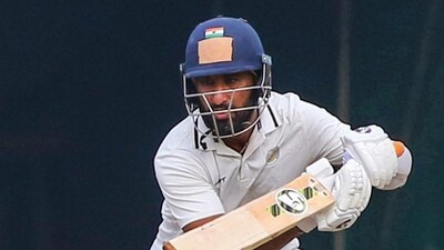 Cheteshwar Pujara plays a shot during the third day of the Ranji Trophy cricket match between Saurashtra and Vidarbha (PTI) Cheteshwar Pujara plays a shot during the third day of the Ranji Trophy cricket match between Saurashtra and Vidarbha (PTI)