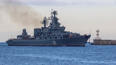 The Russian Navy's guided missile cruiser Moskva sails back into a harbour after tracking NATO warships in the Black Sea. (REUTERS)