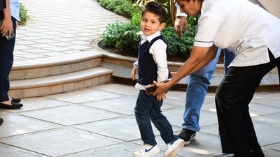 Little Jeh arrived in style for his third birthday party. He wore blue jeans and white shirt with a sleeveless vest. Kareena and Saif's son also responded as paparazzi called his name as he ran inside his party venue. Jeh was accompanied by his nannies. (Varinder Chawla) Little Jeh arrived in style for his third birthday party. He wore blue jeans and white shirt with a sleeveless vest. Kareena and Saif's son also responded as paparazzi called his name as he ran inside his party venue. Jeh was accompanied by his nannies. (Varinder Chawla)