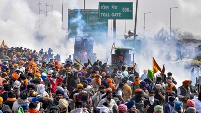 The Haryana Police on Wednesday hurled tear gas shells to disperse farmers from Punjab at Shambhu and Khanauri border points as they tried to move towards the barricades. (PTI) The Haryana Police on Wednesday hurled tear gas shells to disperse farmers from Punjab at Shambhu and Khanauri border points as they tried to move towards the barricades. (PTI)