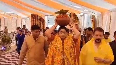Smriti Irani and her husband performing griha pravesh at their Amethi residence on Thursday.