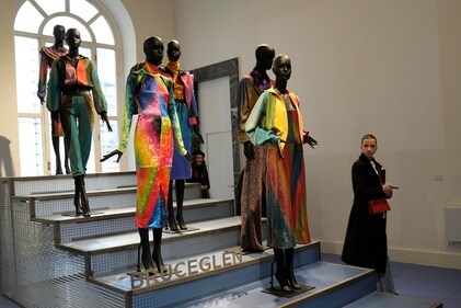 Creations of BruceGlen brand are displayed at the fashion hub part of the women's Fall-Winter 2024-25 collection presented in Milan, northern Italy, Wednesday, Feb. 21, 2024. (AP Photo/Antonio Calanni) (AP) Creations of BruceGlen brand are displayed at the fashion hub part of the women's Fall-Winter 2024-25 collection presented in Milan, northern Italy, Wednesday, Feb. 21, 2024. (AP Photo/Antonio Calanni) (AP)